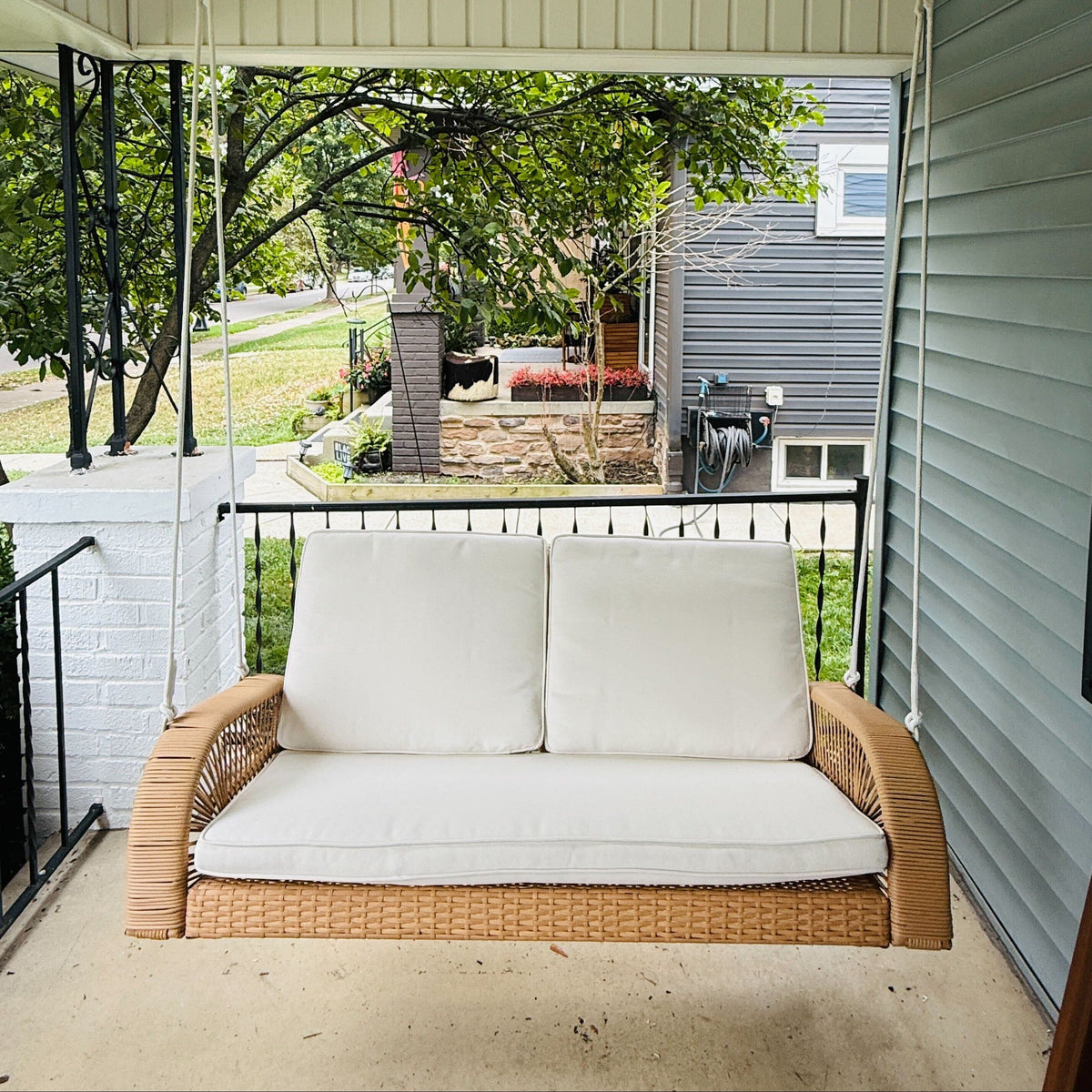 East Green Lucca Wicker Porch Swing with Cushions