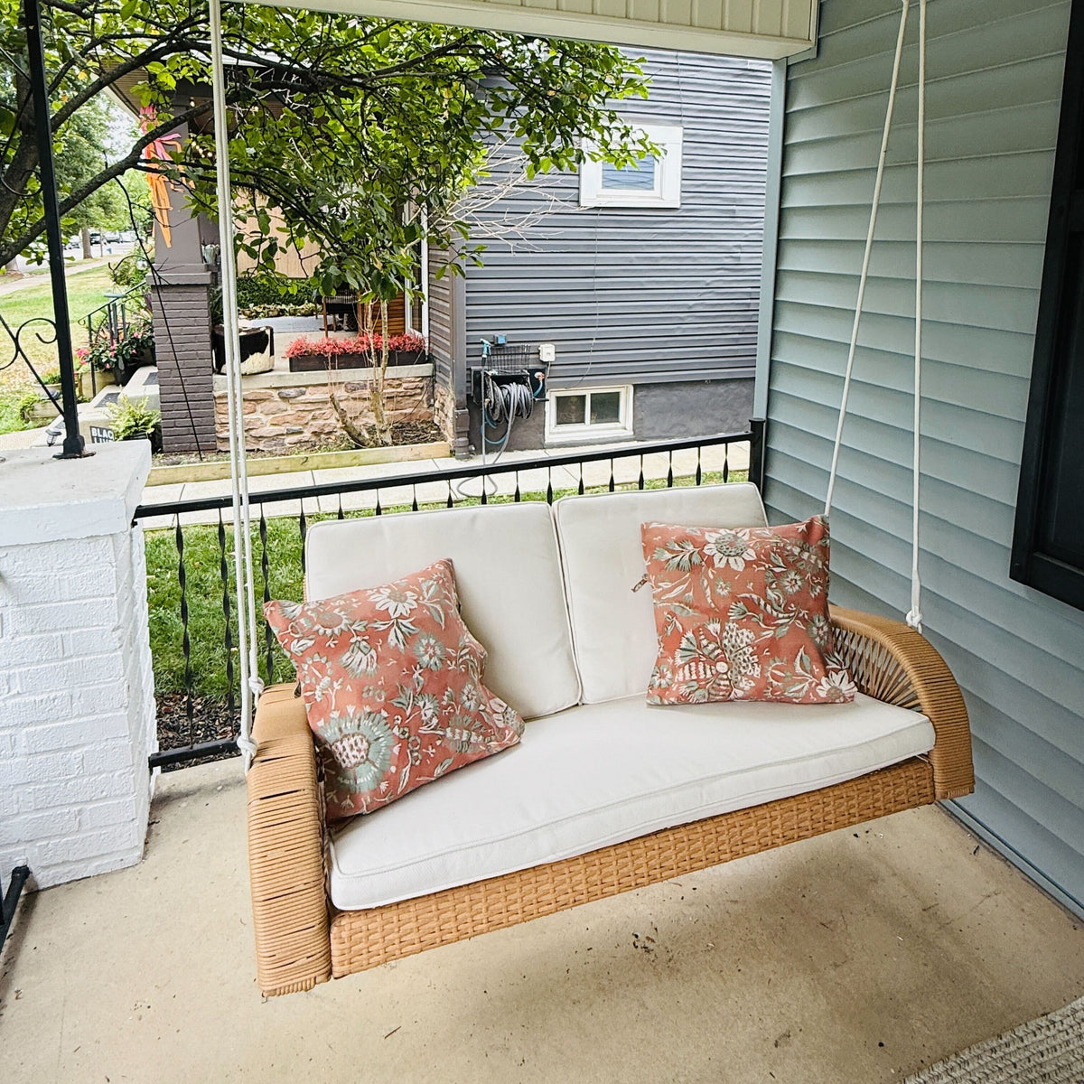 East Green Lucca Wicker Porch Swing with Cushions