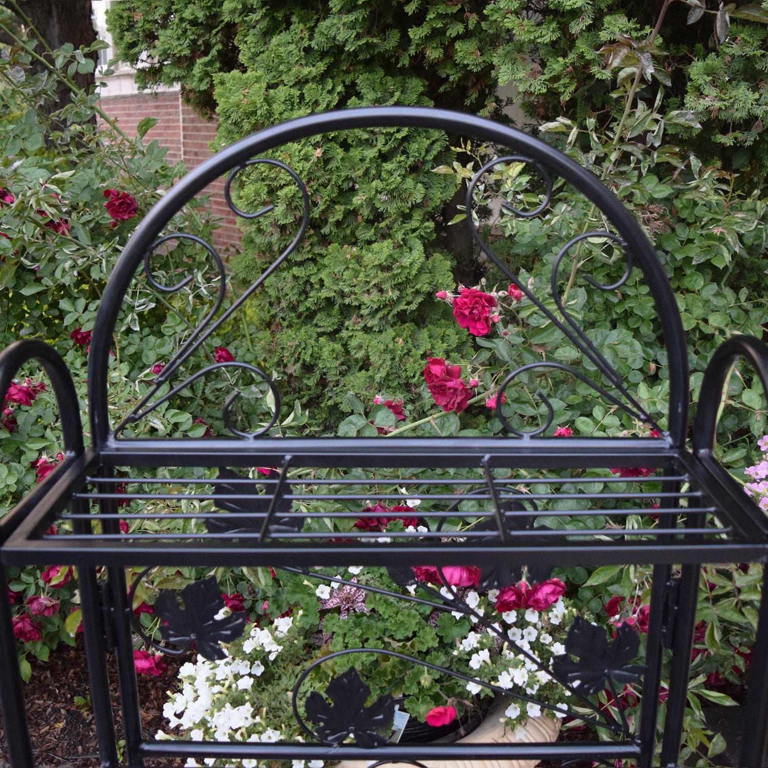 bakers rack plants 4-Tier Black Bakers Rack Plant Stand with Leaves – Plow & Hearth