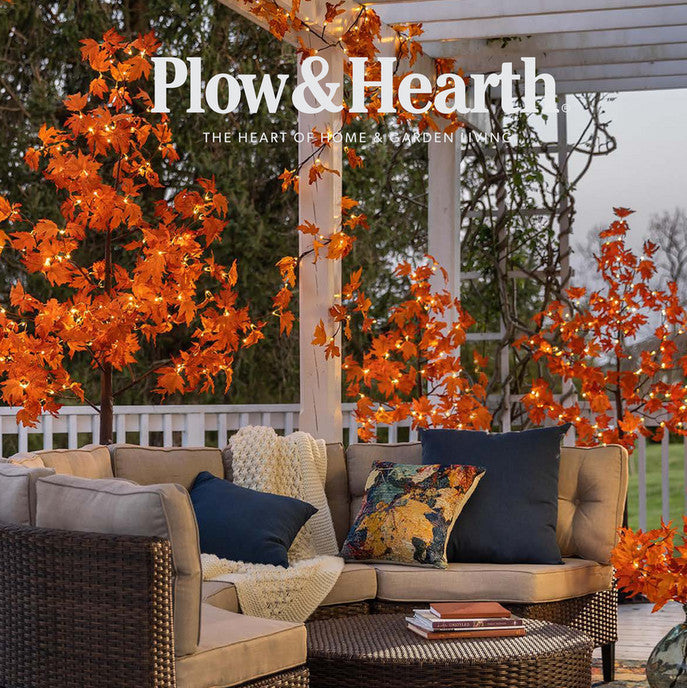 Outdoor seating area with fall decorations - Plow & Hearth Fall Catalog.