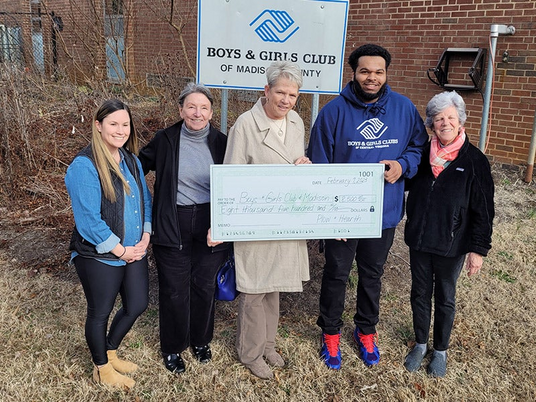 Pictured: Plow & Hearth CEO Leslie Newton presents the donation to the Boys and Girls Clubs of Central Virginia in Madison