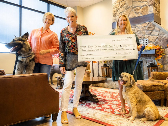 Pictured left to right: Max, Heather Berry, Leslie Newton (CEO Plow & Hearth), Kimberly Hawk (Founder), Curly