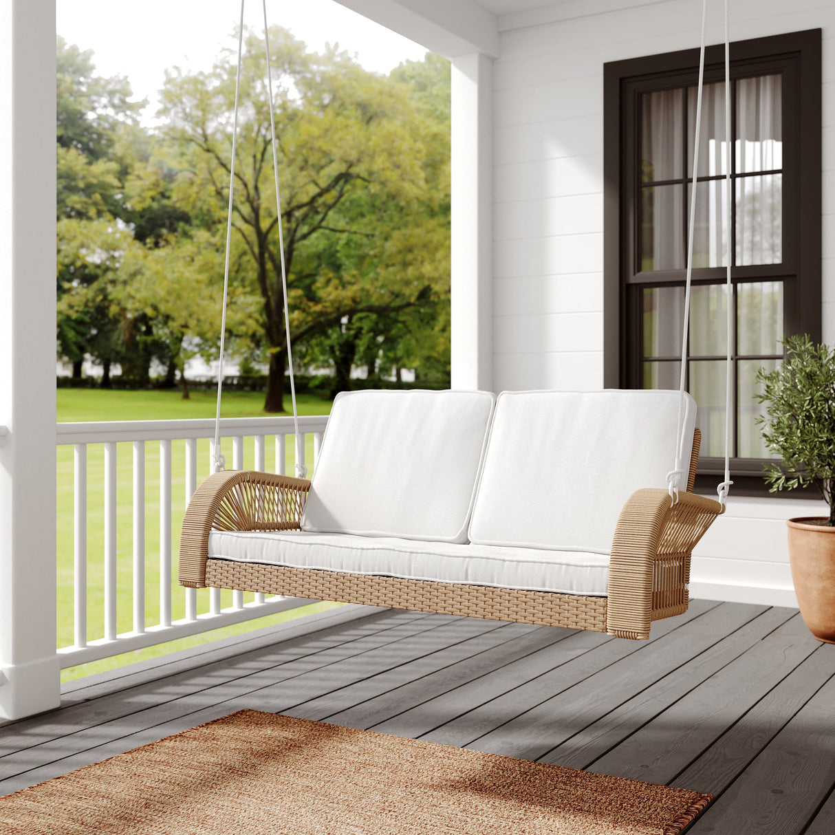 East Green Lucca Wicker Porch Swing with Cushions