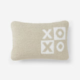Beige pillow with 'XO' pattern on a white background