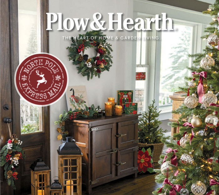 Magazine cover featuring a Christmas-themed interior with a dog and decorated tree, titled 'Plow & Hearth'.