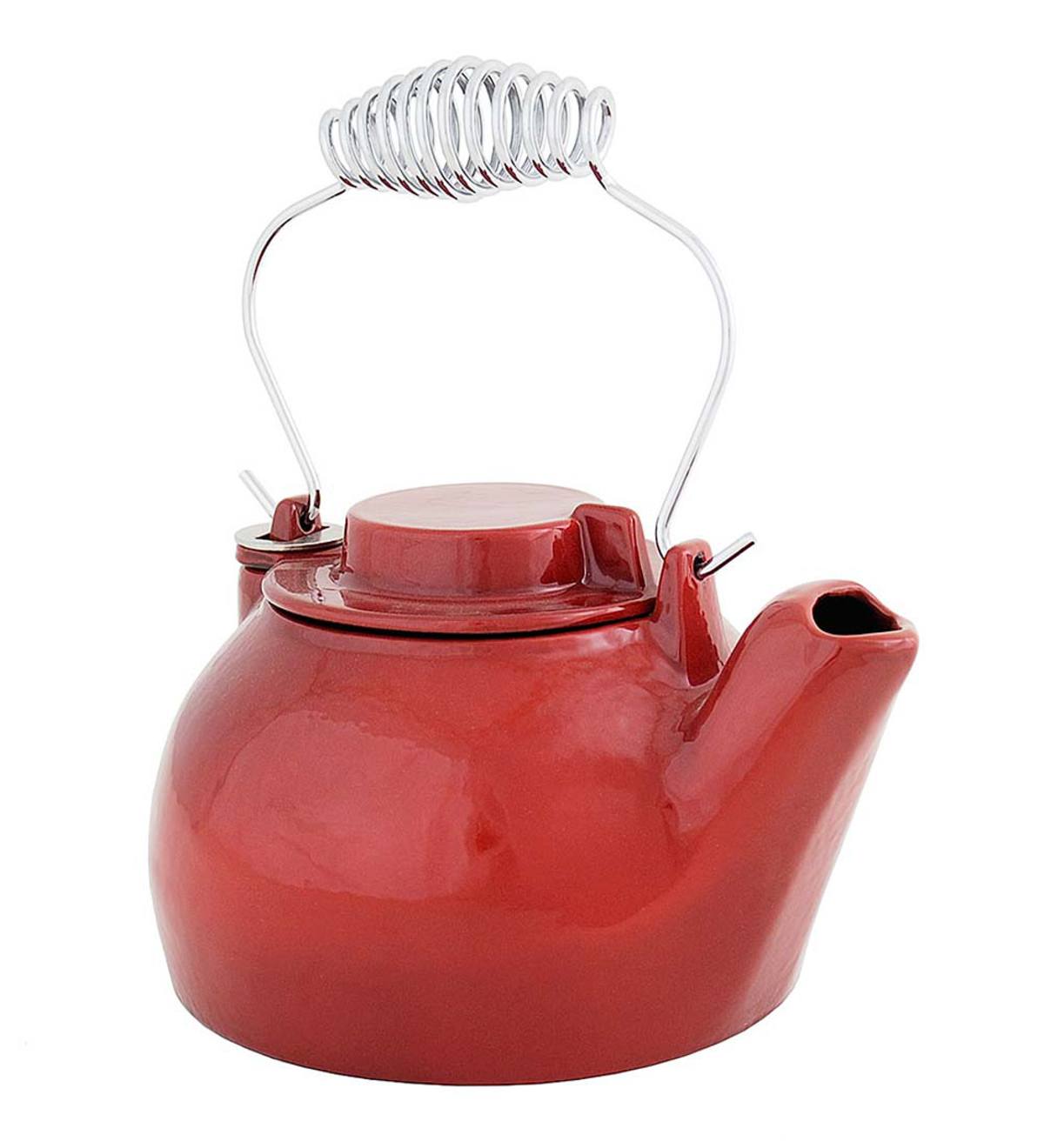 Cast iron tea outlet kettle for wood stove