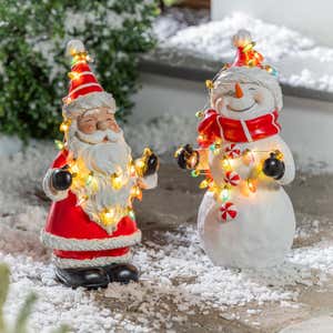 Snowman Statue with String Lights